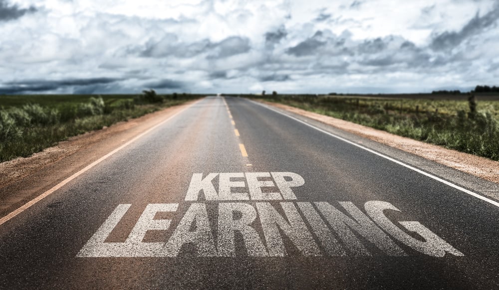 Keep Learning written on rural road-1 Keep Learning written on rural road-1