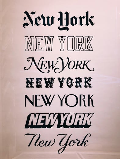 New York in various fonts. Photo by jon-tyson-x5BnZEywCUg-unsplash